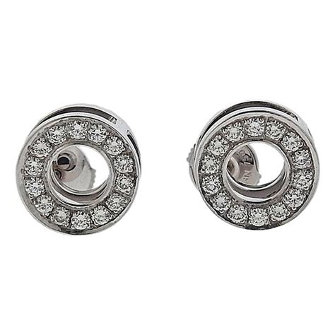 hermes gold stud earrings